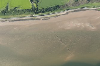 Oblique aerial view of the fish trap, looking S.