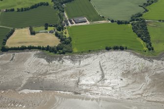 Oblique aerial view of the fish traps, looking SE.