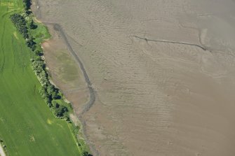 Oblique aerial view of the fish traps, looking SW.