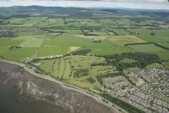 General oblique aerial view of the Invergordon Golf Course and Invergordon Castle, looking NNW.