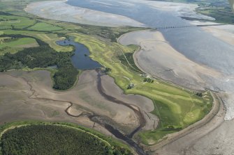 Oblique aerial view of the Carnegie Golf Course and the Meikle Ferry pier with the Dornoch Firth road bridge beyond, looking ESE.