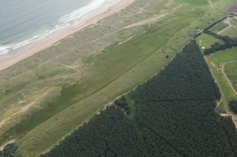 Oblique aerial view of the trenches, looking E.