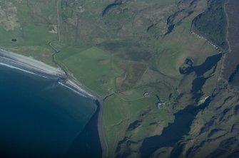 Aerial view from the SW. The farm of Laig is lower right of centre with the former loch beyond it, indicated by uncultivated ground. Sròn Laimhrige (Rock of the Landing Place) is at top right, above the small loch. (Colin Martin)