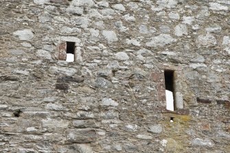 Invermark Castle. Detail of two slit windows at 3rd floor level of west face
