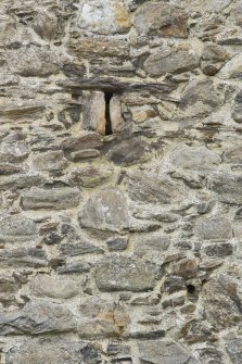 Invermark Castle. Detail of slit window on north face