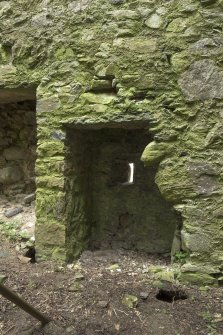 Invermark Castle. 1st floor, view of guard robe on north wall