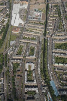 Oblique aerial view of the Union Canal and Fountainbridge, looking ENE.