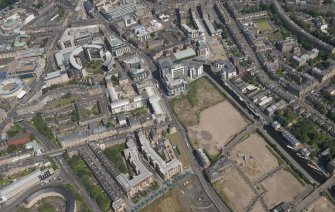 Oblique aerial view of Fountainbridge and Lochrin Basin, looking E.