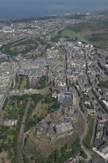 General oblique aerial view of Edinburgh Old Town, Edinburgh Castle and Waverley Station, looking ENE.