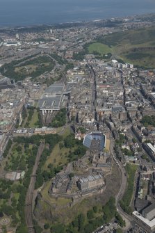 General oblique aerial view of Edinburgh Old Town, Edinburgh Castle and Waverley Station, looking ENE.