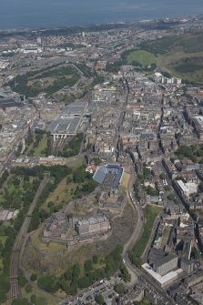 General oblique aerial view of Edinburgh Old Town, Edinburgh Castle and Waverley Station, looking NE.