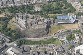 Oblique aerial view of Edinburgh Castle and Esplanade, looking N.