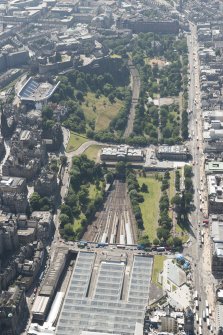 Oblique aerial view of Edinburgh Castle and Esplanade, looking SW.