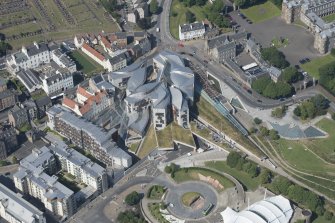 Oblique aerial view of the Scottish Parliament, looking NE.