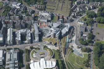 Oblique aerial view of the Scottish Parliament, looking NW.