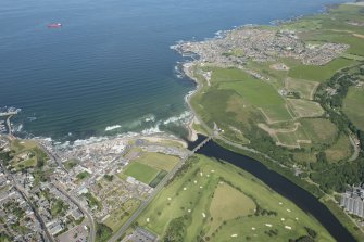 General oblique aerial view centred on Banff Bridge with Banff in the foreground and MacDuff beyond, looking NE.