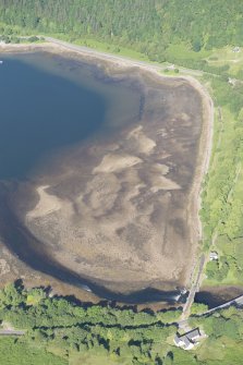 Oblique aerial view of the fish trap and bridges, looking W.