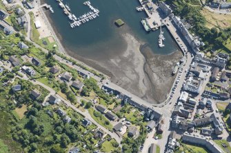 Oblique aerial view of Tarbert, looking ENE.