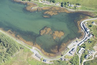 Oblique aerial view of the fish trap at Bunessan, looking NE.