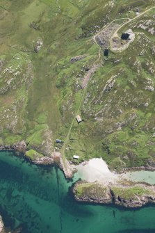 Oblique aerial view of the quarry and pier, looking E.