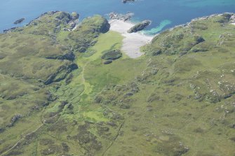 Oblique aerial view of Columba's Bay, Iona, looking S.