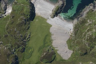 Oblique aerial view of Port na Curaich, Iona, looking S.