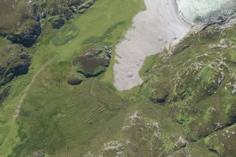 Oblique aerial view of Port na Curaich, Iona, looking S.