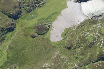 Oblique aerial view of Port na Curaich, Iona, looking SSE.