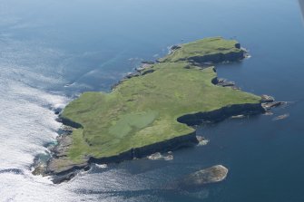 General oblique aerial view of Staffa, looking SE.