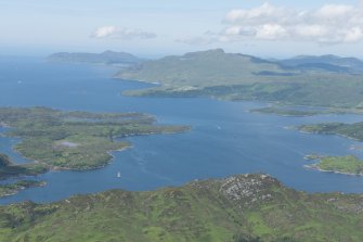 General oblique aerial view with Loch Sunart and Oronsay in the foreground and Ardnamurchan in the distance, looking WNW.