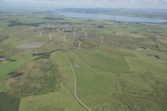 General oblique aerial view of the Craigenlee Fell wind farm with Loch Ryan in the distance, looking NNE.