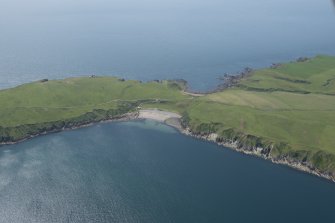 Oblique aerial view of the Mull of Galloway centred on the East and West Tarbet, looking SW.