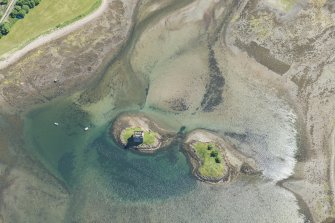 Oblique aerial view of Castle Stalker and the kelp grids, looking SSE.