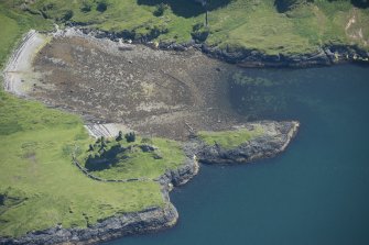 Oblique aerial view of the fish trap and Castle Coeffin, looking SE.