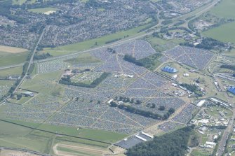 Oblique aerial view of camping at T in the Park, looking SSE.