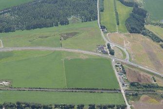 Oblique aerial view of the Dunragit bypass with Droughdool mound beyond, looking SSW.