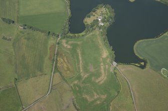 Oblique aerial view centred on the parchmarks beside Soulseat Loch, looking NNE.