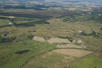 General oblique aerial view of the gWest golf course and gated community development, looking NE.