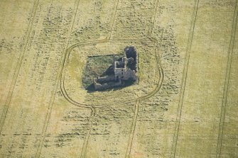 Oblique aerial view of Castle of Pittulie, looking ENE.