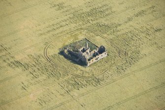 Oblique aerial view of Castle of Pittulie, looking NNE.