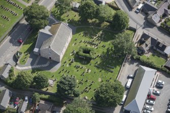 Oblique aerial view of Chapel of Garioch Parish Church, St Mary's Chapel and Old Parish Church, looking E.