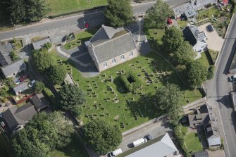 Oblique aerial view of Chapel of Garioch Parish Church, St Mary's Chapel and Old Parish Church, looking NNE.