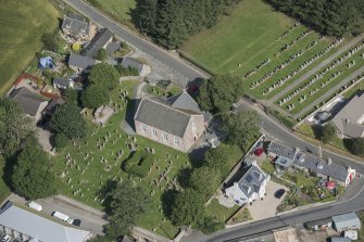 Oblique aerial view of Chapel of Garioch Parish Church, St Mary's Chapel and Old Parish Church, looking NNW.