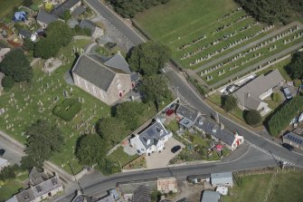 Oblique aerial view of Chapel of Garioch Parish Church, St Mary's Chapel and Old Parish Church, looking NW.