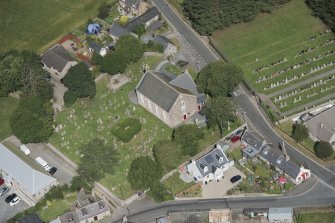 Oblique aerial view of Chapel of Garioch Parish Church, St Mary's Chapel and Old Parish Church, looking NW.