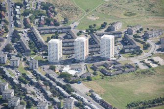 General oblique aerial view of Balnagask Circle centred on Morven Court, Brimmond Court and Grampian Court, looking E.