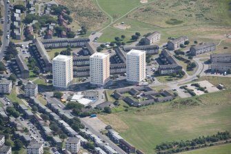 General oblique aerial view of Balnagask Circle centred on Morven Court, Brimmond Court and Grampian Court, looking ENE.