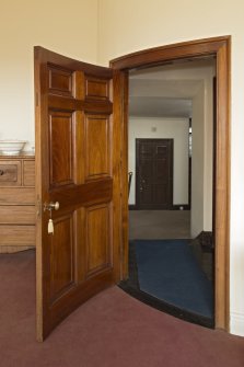 1st floor, west bedroom, view of curved door to landing