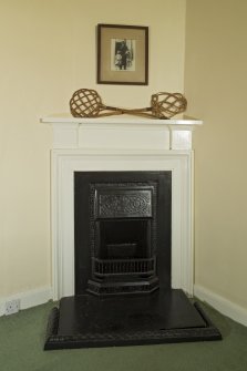 1st floor, west bedroom dressing room, detail of fireplace