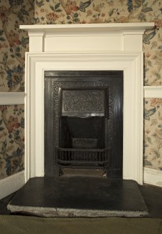 1st floor, south bedroom dressing room, detail of fireplace